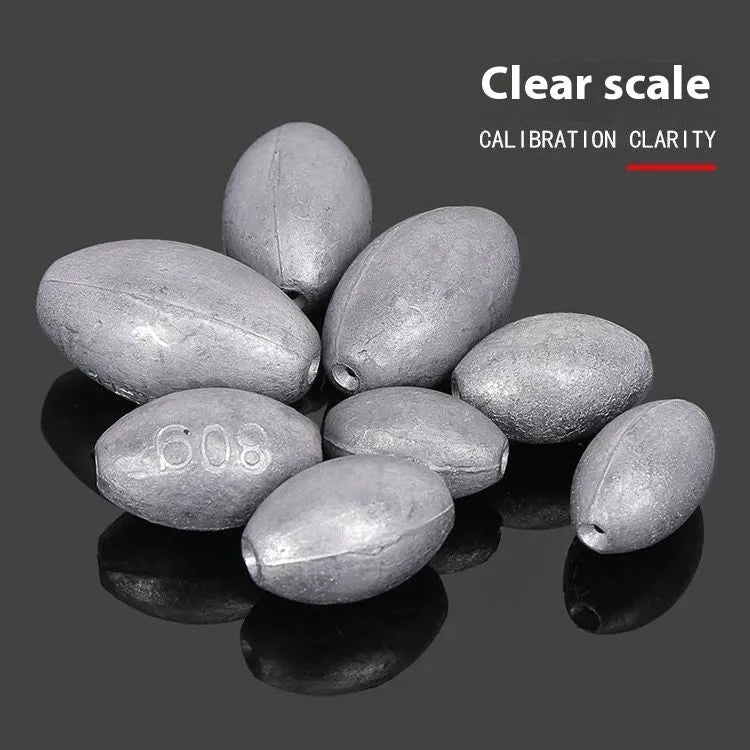 Olive-shaped fishing sinker with scale texture and plastic core construction for sea fishing
