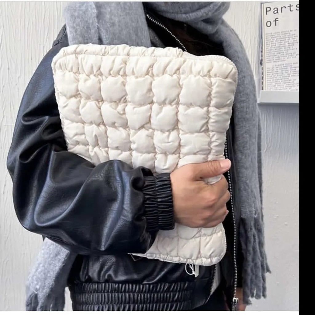 Large black and white nylon laptop bag showing cloud cotton storage compartment, suitable for 11 to 15.6 inch computers.