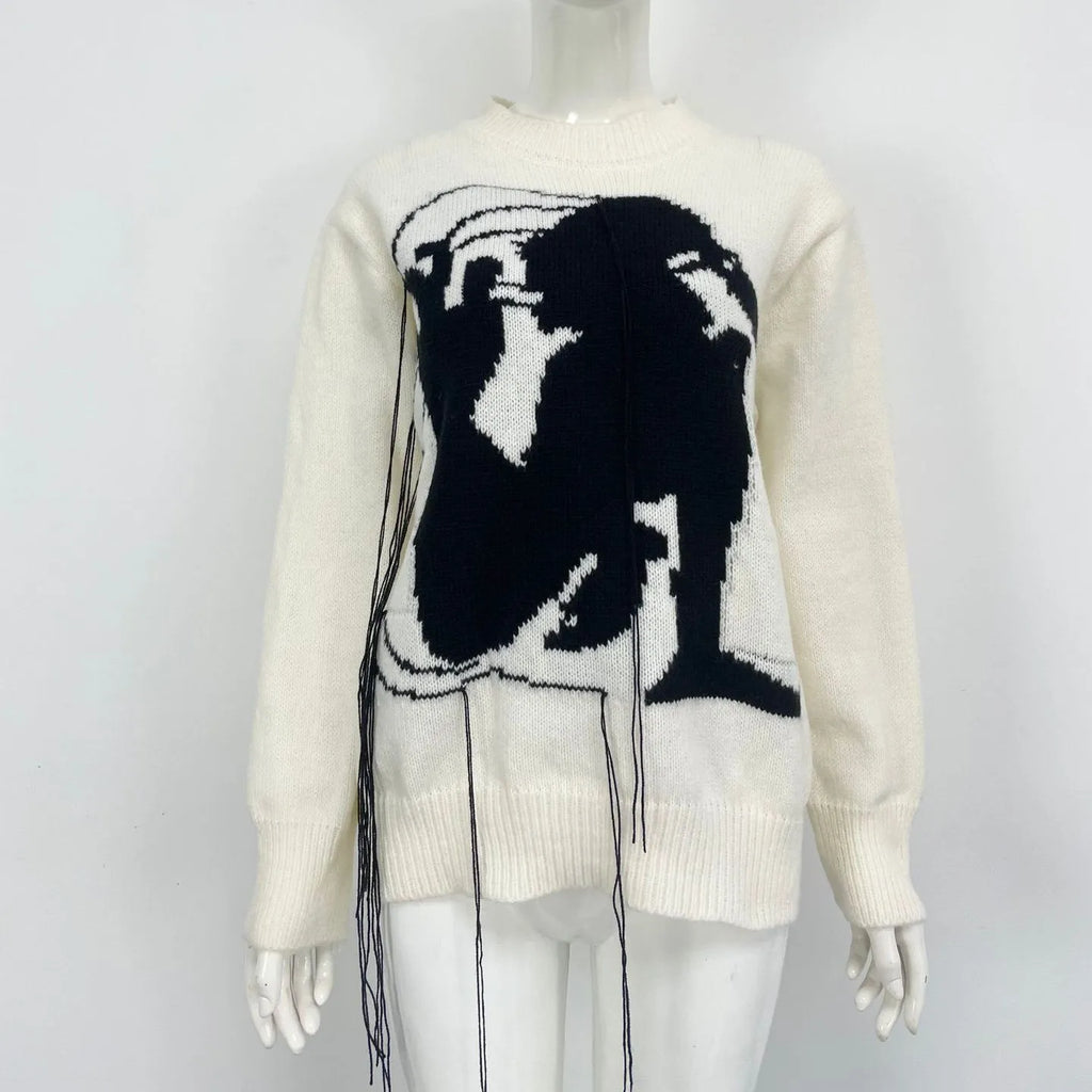 Women's grey alpaca wool sweater with abstract pattern and tassel design on front