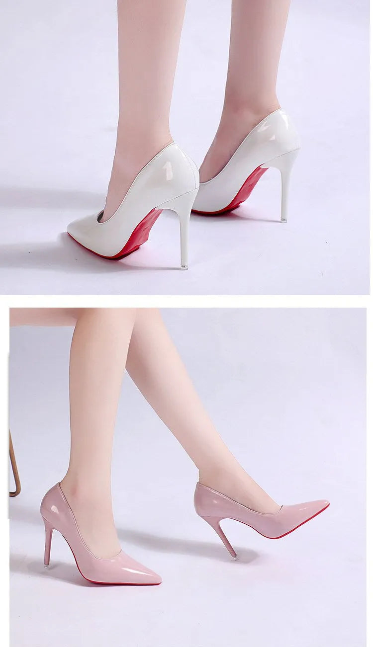 Women's black pointed toe stiletto pump with a shallow mouth design on a rubber sole.