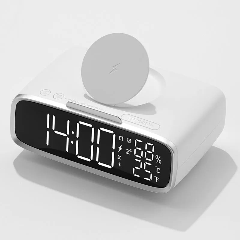 White Bluetooth speaker with wireless charging pad and integrated night lamp