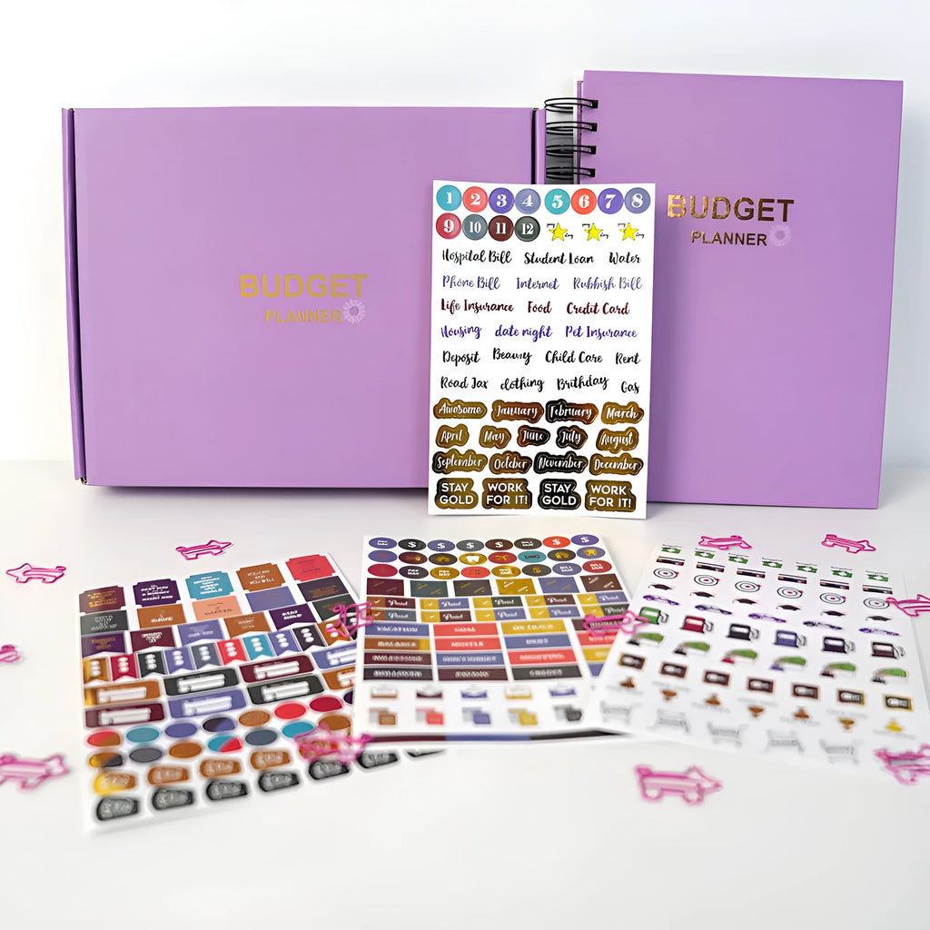 J12 Purple coil-bound financial planning notebook with Daolin paper, pen, stickers, and paper clips for monthly budgeting
