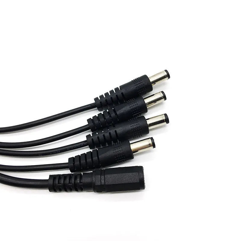 Black DC monitoring power cord with one-to-four splitter, 0.39 metres long with 5.5mm connectors