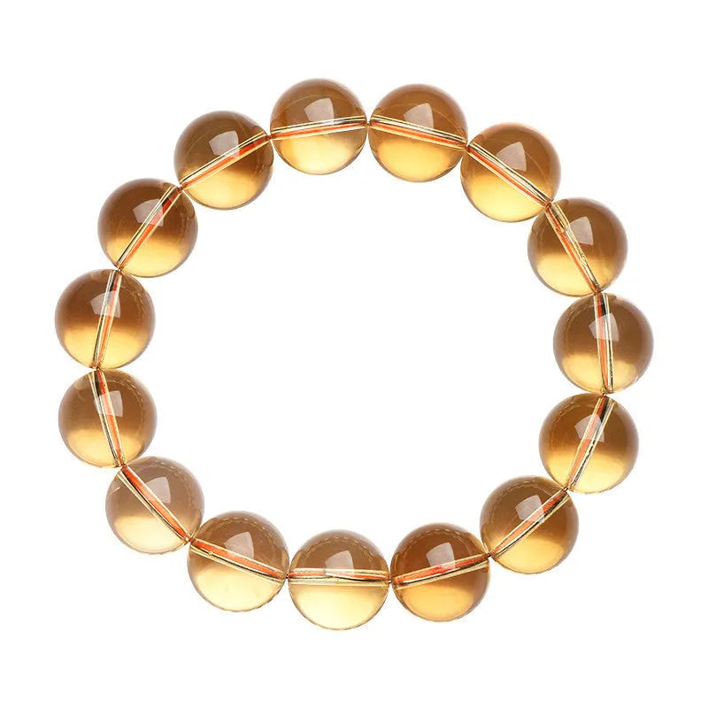 Natural citrine scattered bead bracelet showing polished stones in warm tones