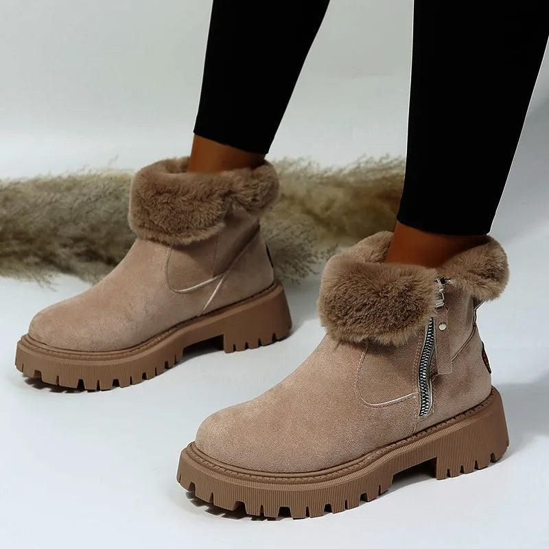 Women's black faux suede snow boots with thick plush lining and side zip closure