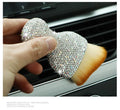 Soft PVC car interior cleaning brush for dust removal on dashboard and seats.