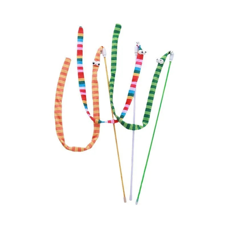 Green cat wand toy with long plush strip on a polycarbonate pole, shown mid-swing.