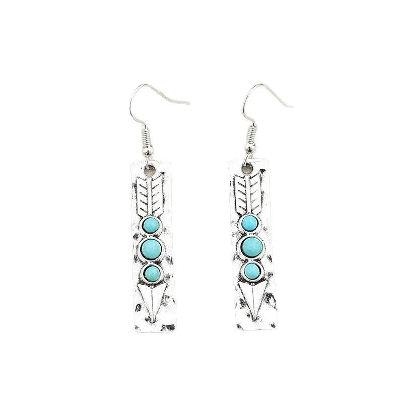 Silver geometric drop earrings with turquoise stone inlay on long strip design