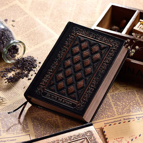 A4 embossed faux leather notepad with textured cover in bronze colour.