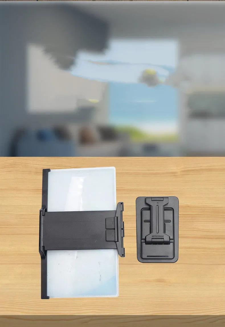 Black 12-inch curved mobile phone screen amplifier with separate folding phone holder on desktop