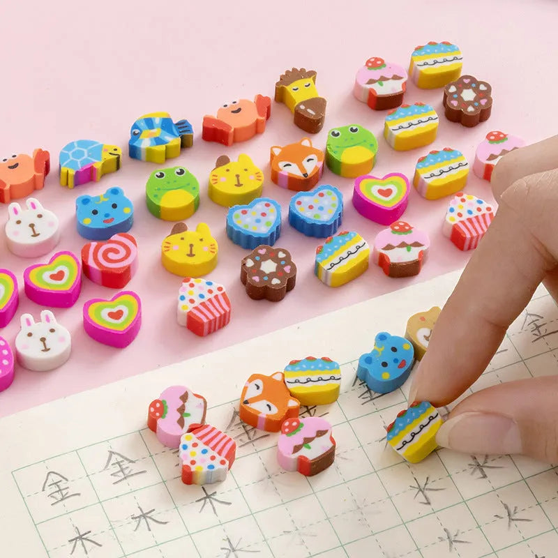 Open pearlescent film bag showing 50 small colourful cartoon fruit-themed rubber erasers.