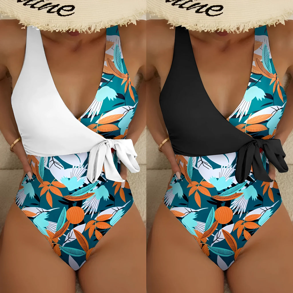 Women's high-waist one-piece swimsuit in a printed pattern, showing conservative cut and style.