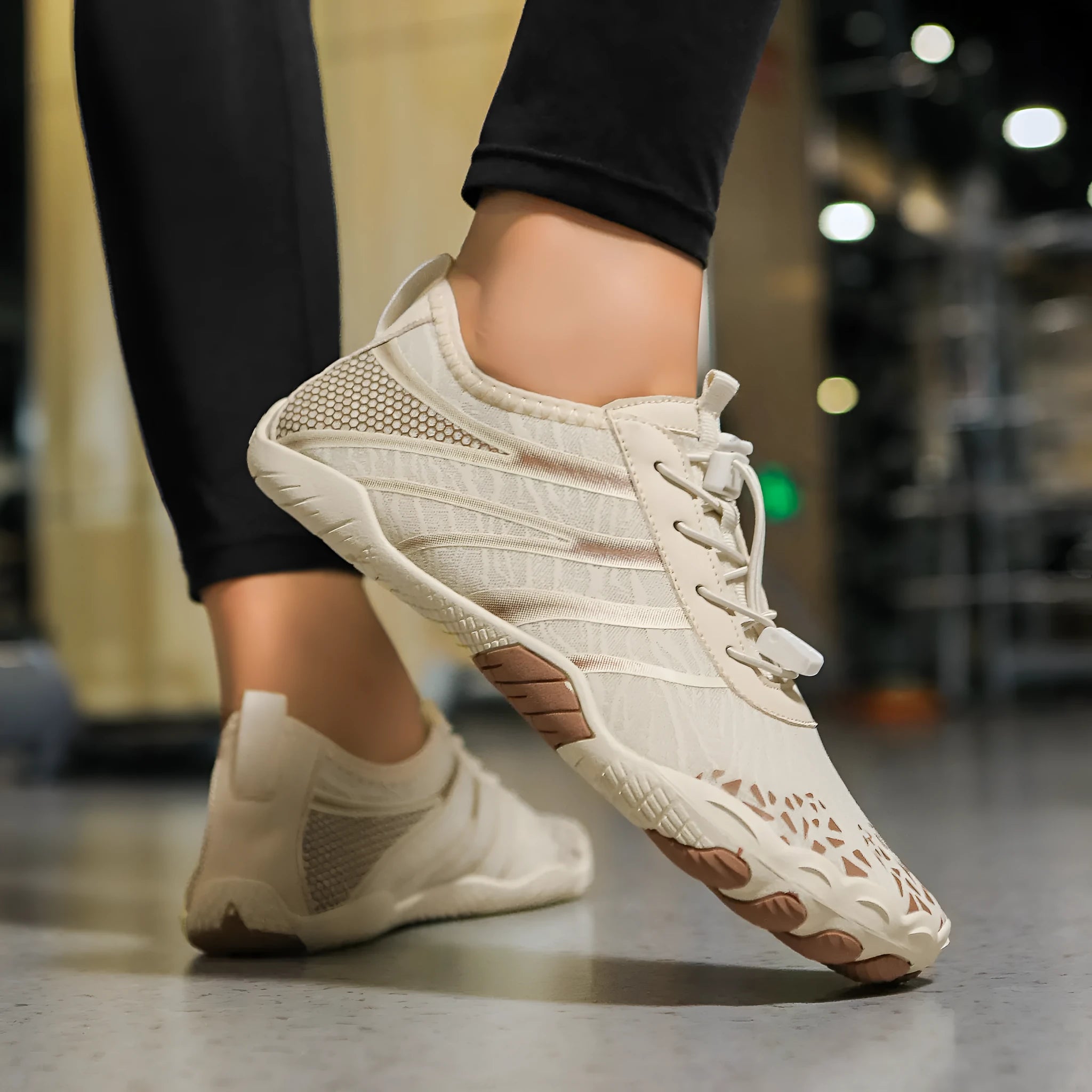 Beach running shoes with Lycra stretch fabric upper in various colours, showing casual design.