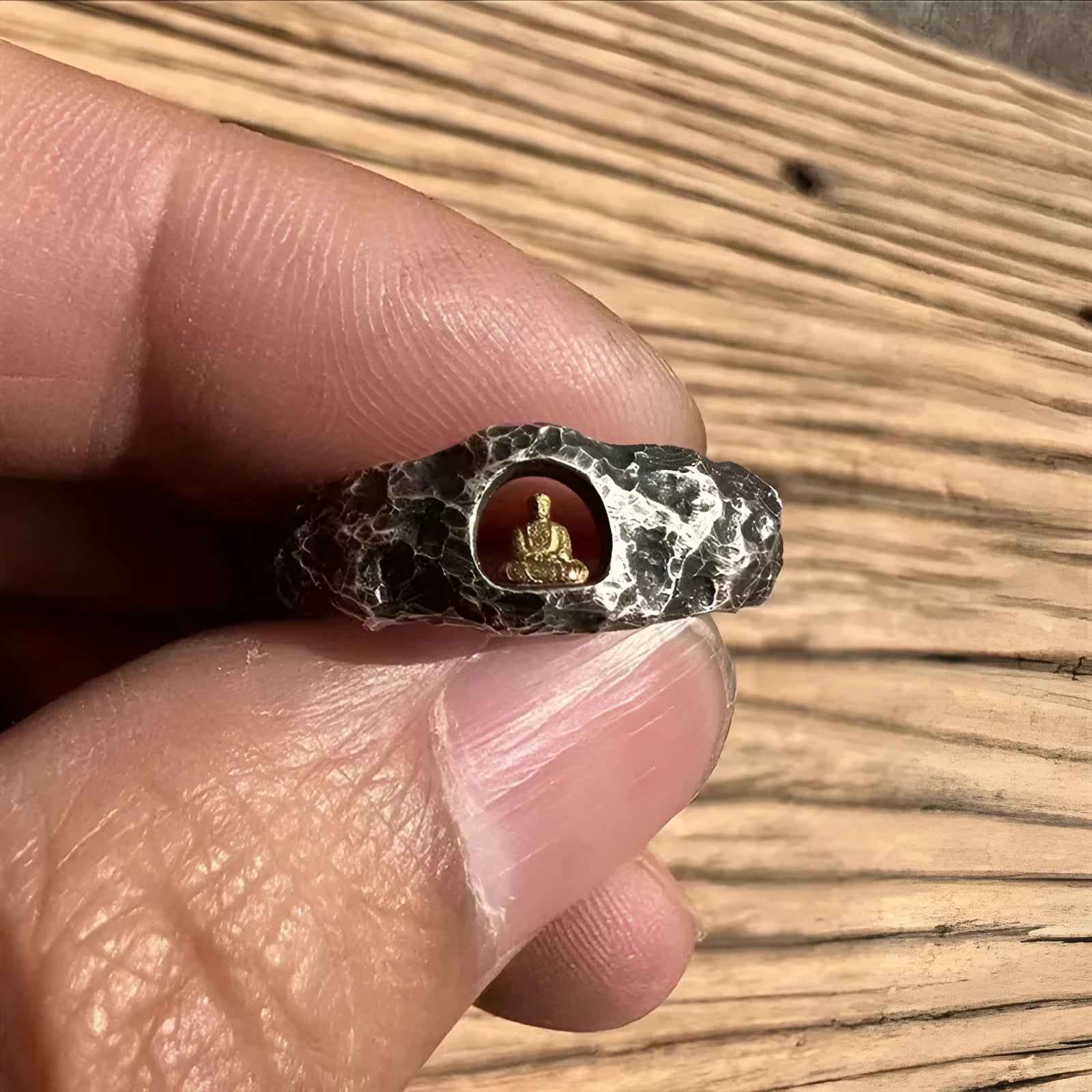 Hand-forged copper grotto Buddha ring with rock texture surface in size 8 measurement