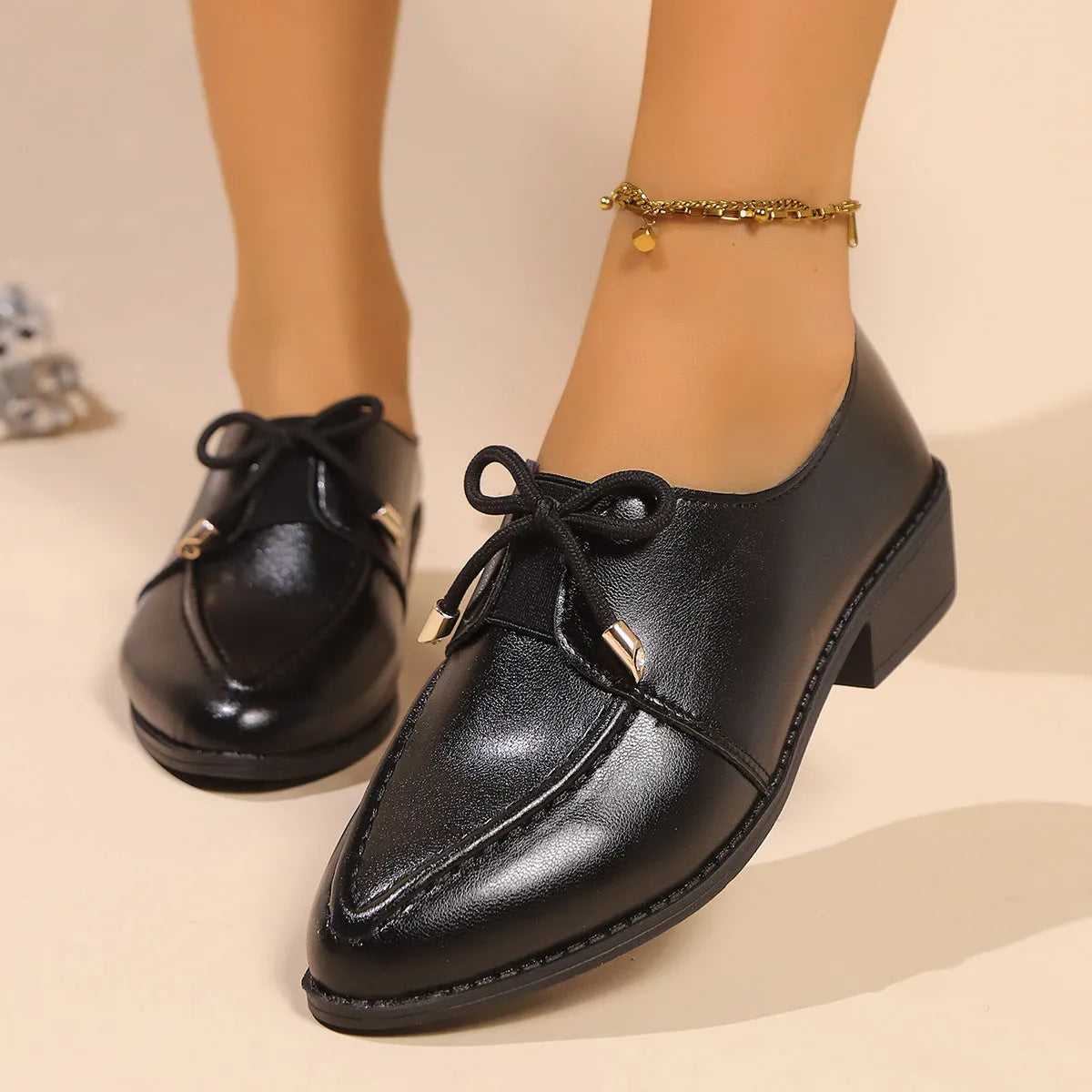 Women's British-style leather shoes with decorative bow detail in three style options