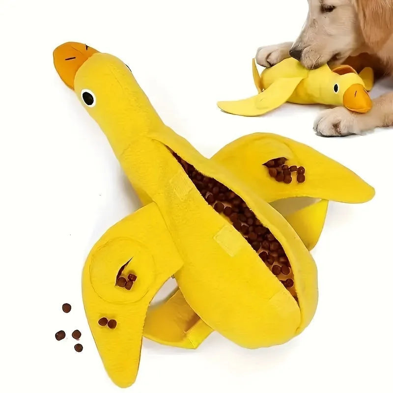 Yellow plush duck dog toy with a treat compartment and built-in sound module for training and enrichment.
