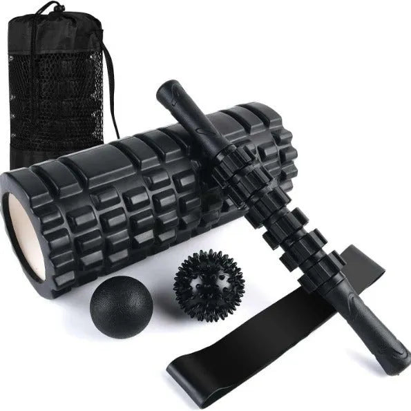 Black 33cm long fitness foam roller with six segmented pieces on a plain background.