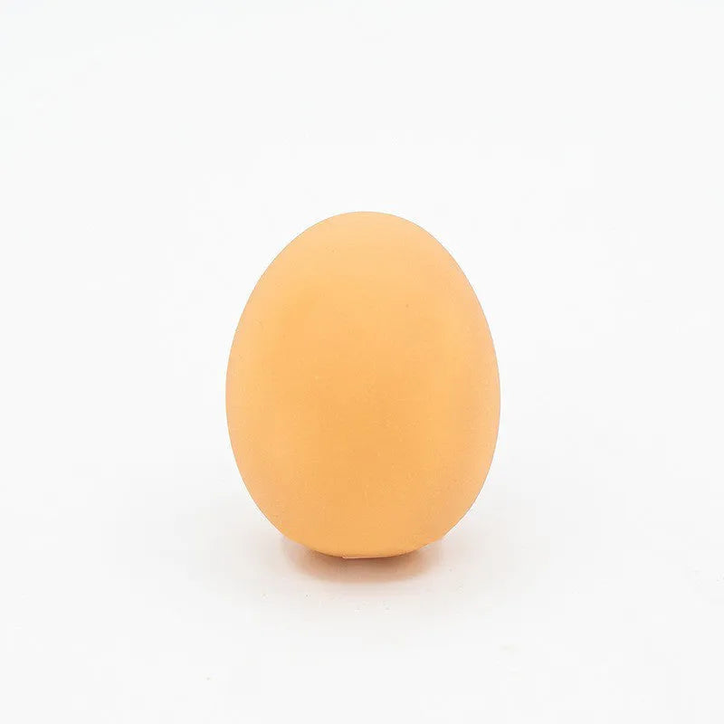 Orange rubber egg-shaped dog chew toy with crinkly sound for small medium breeds