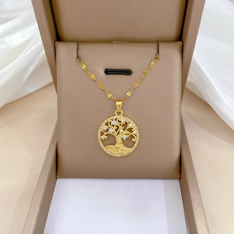 Gold-plated cross necklace with mother-of-pearl pendant and rhinestone detailing on adjustable chain