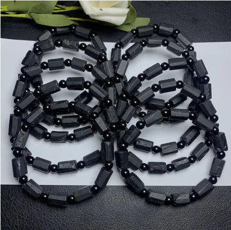 Black tourmaline rough stone bracelet with 8.5-9mm beads and Seiko treatment