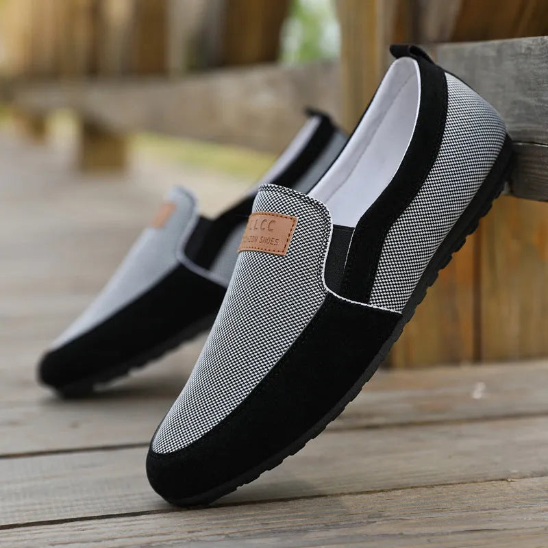 Men's solid-colour canvas board shoes with round toe and rubber sole in grey and khaki options.