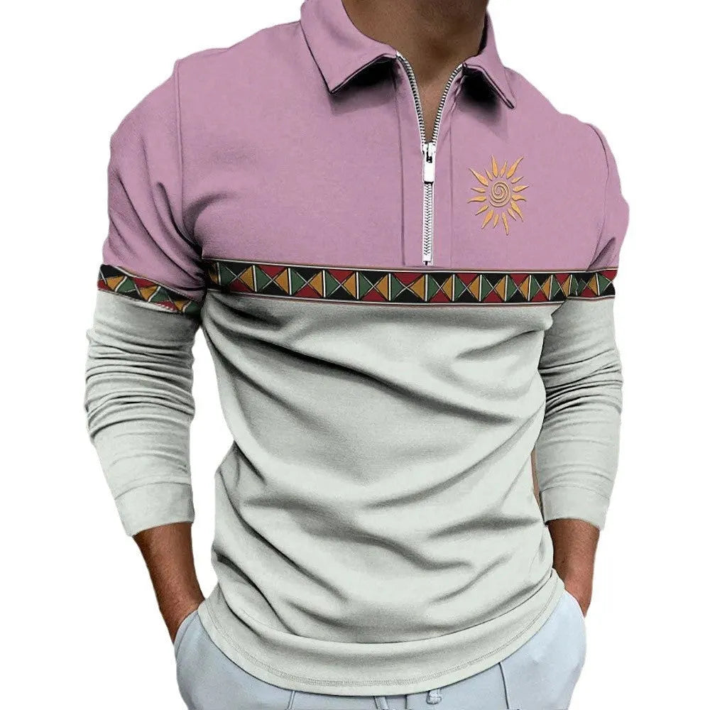 Man wearing a long-sleeved loose-fit striped top with retro colour printing and zipper details.