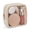 Transparent PVC cosmetic bag showing contents through clear material with dry-wet separation compartments
