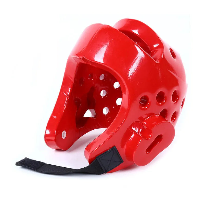 Karate and taekwondo protective gear set with red leg guards, helmet, and boxing gloves