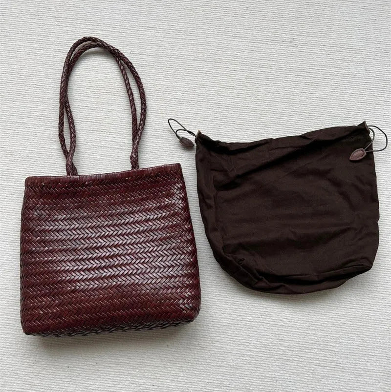 Handmade brown woven tote bag made from vintage top layer cowhide leather with a three-dimensional pocket.