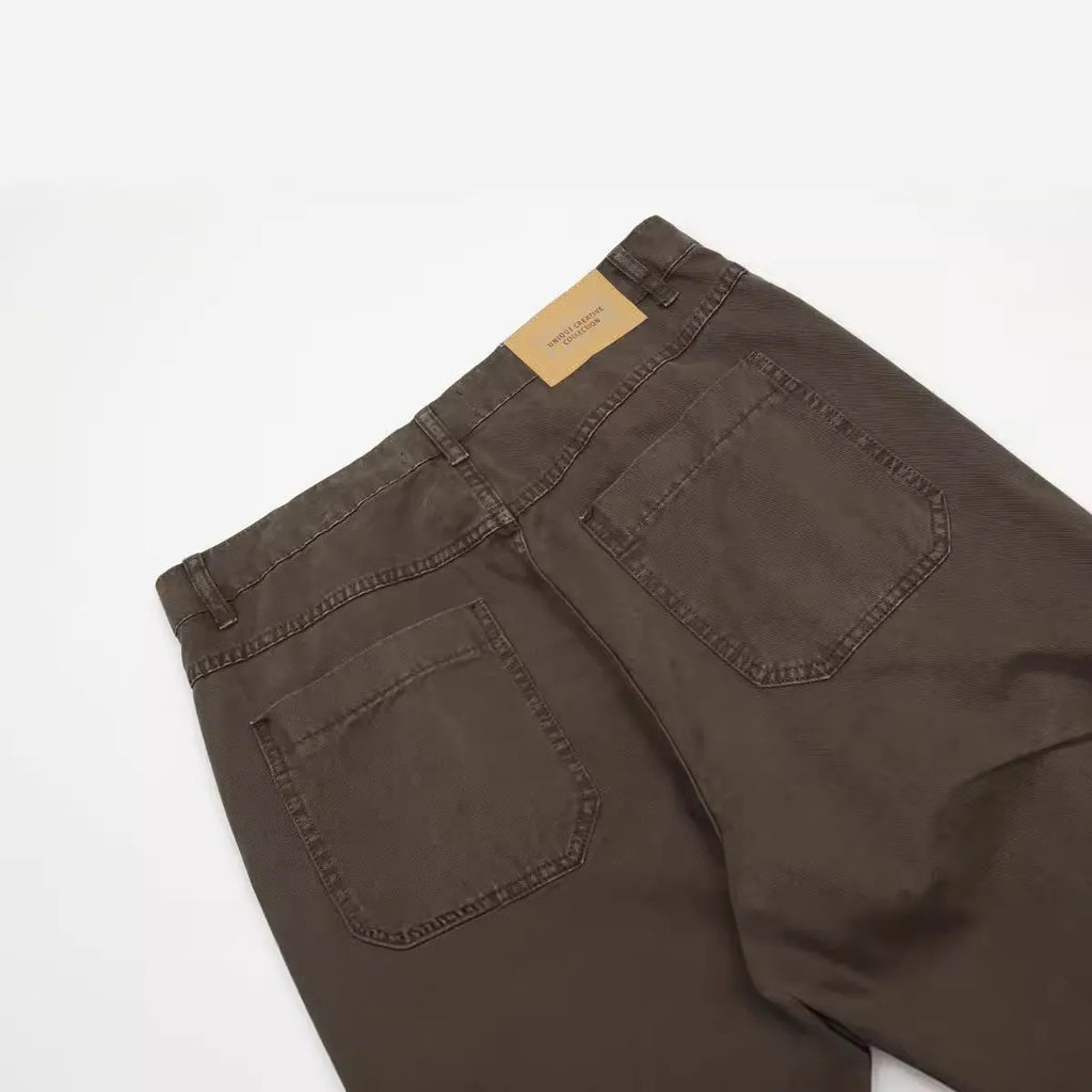 Men's brown straight leg cotton jeans with high waist and zipper fly closure