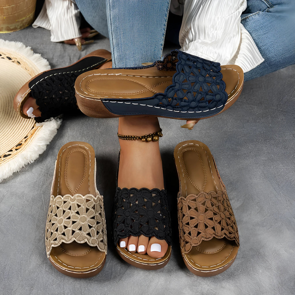 Women's wedge beach slippers with flower cutout detail and fish mouth toe shape in light brown