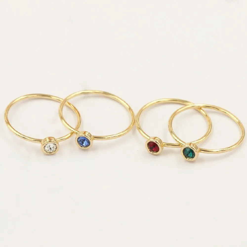 Women's 14K gold-plated copper knuckle ring with zirconia stones in four colour options