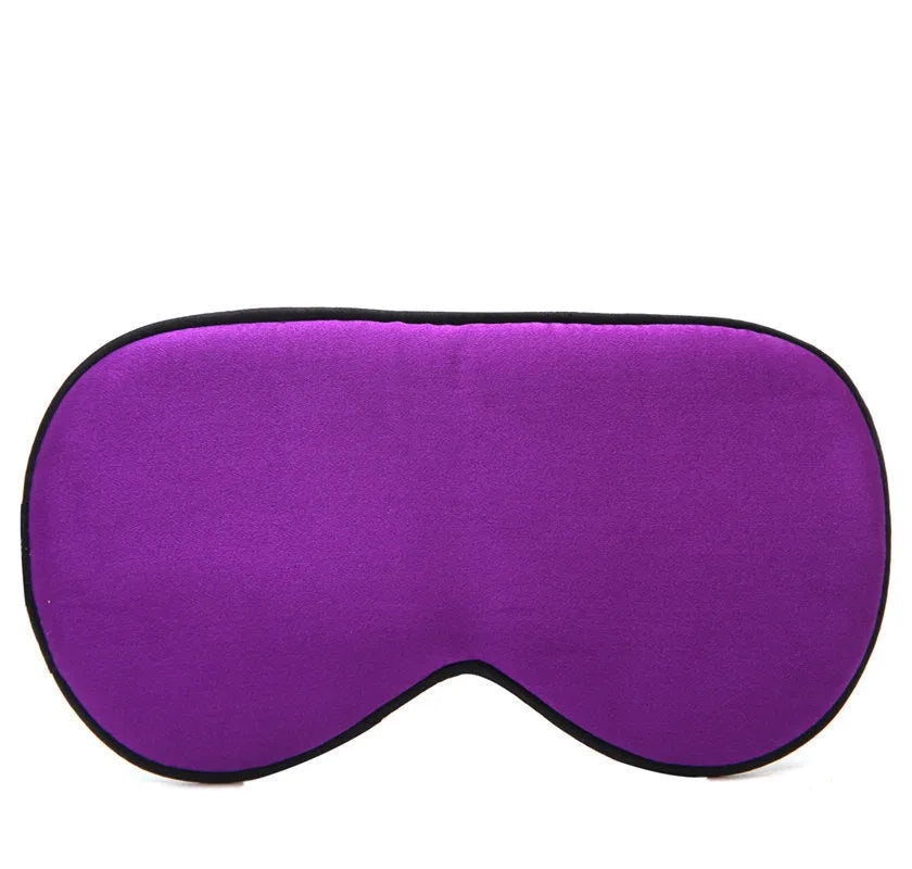 Double-sided mulberry silk sleep mask in multiple colours showing embroidered print and adjustable strap.