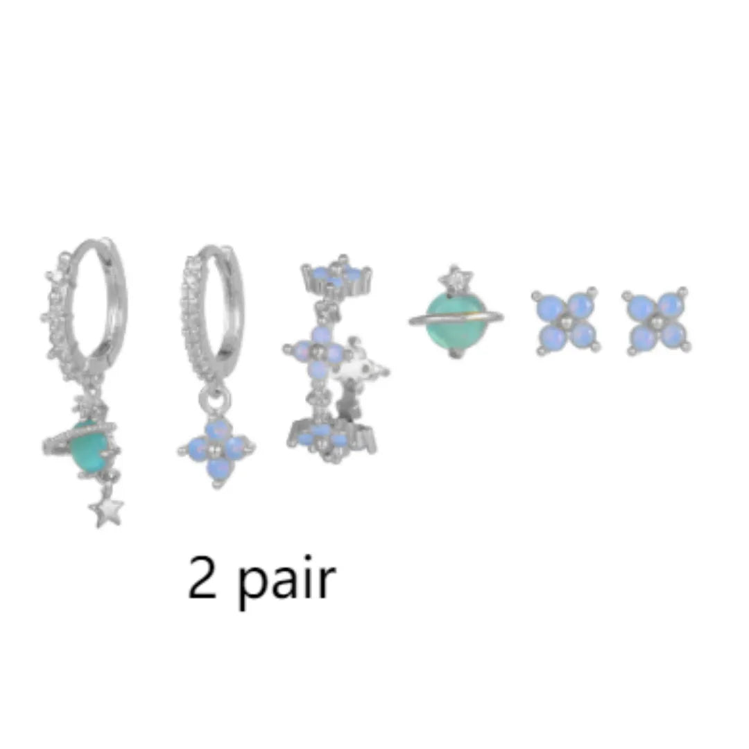 Gold and silver flower stud earrings with zircon stone mosaic centre.
