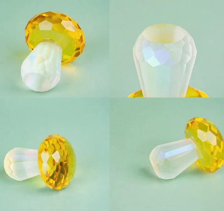 Colourful crystal mushroom decoration in modern geometric style on a white background.