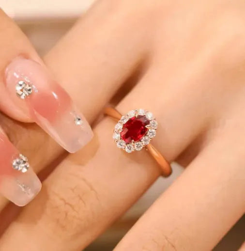 Women's silver ring with blood ruby artificial gemstone and gold pigeon floral design