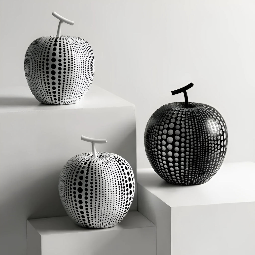 Resin fruit decoration crafts in white, orange, black and blue colour variations showing high and low profile designs