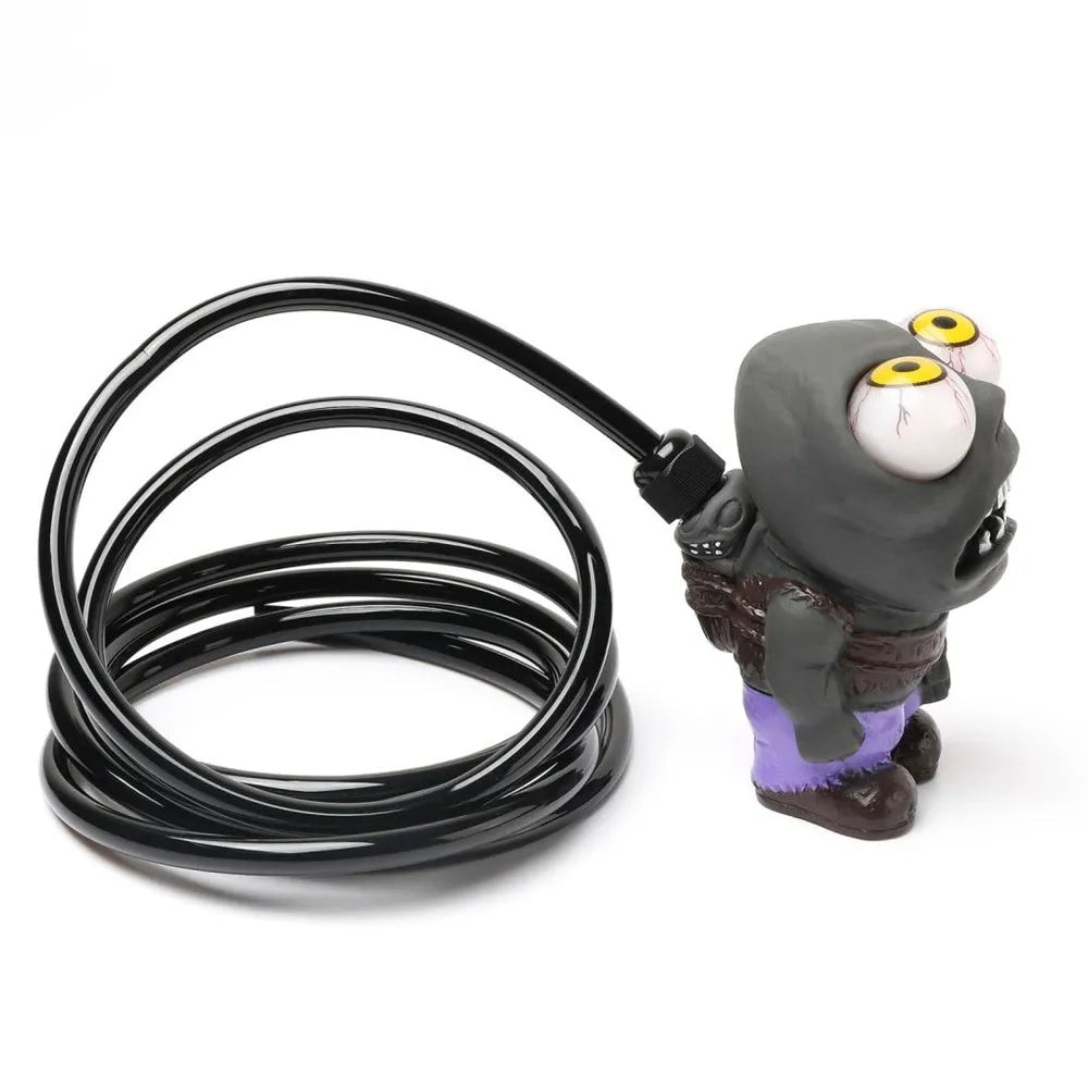 Turbo car blow-off valve ornament kit showing rubber doll, copper tube, pressure valve, and tubing on a car vent.