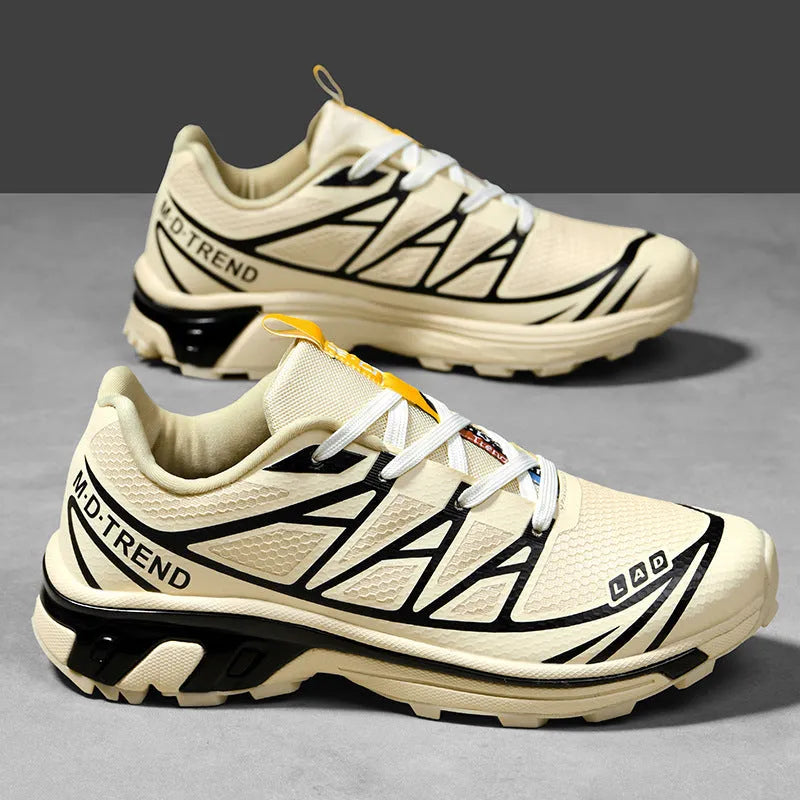 Men's and women's low-top black and grey hiking shoes with rubber sole and lace-up front.