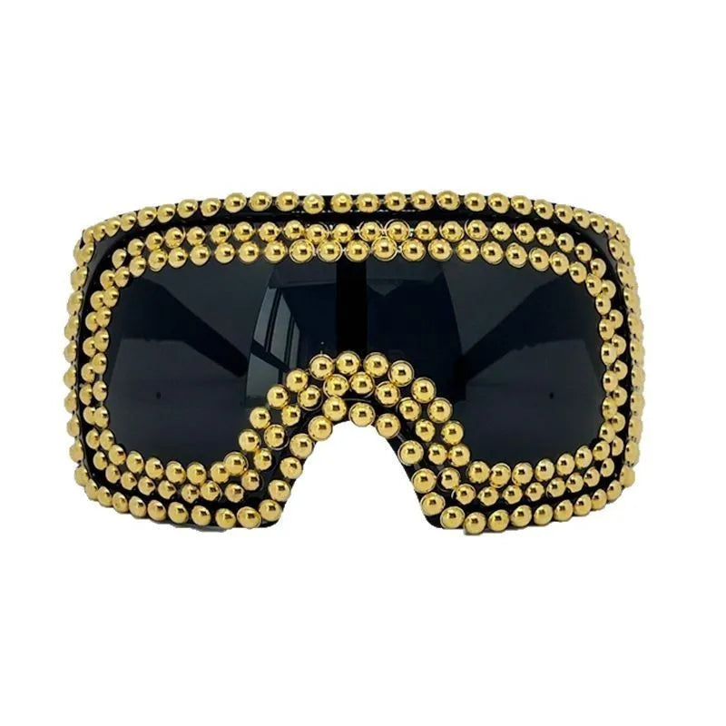 Square frame sunglasses with large rim and punk rivet decoration in silver finish