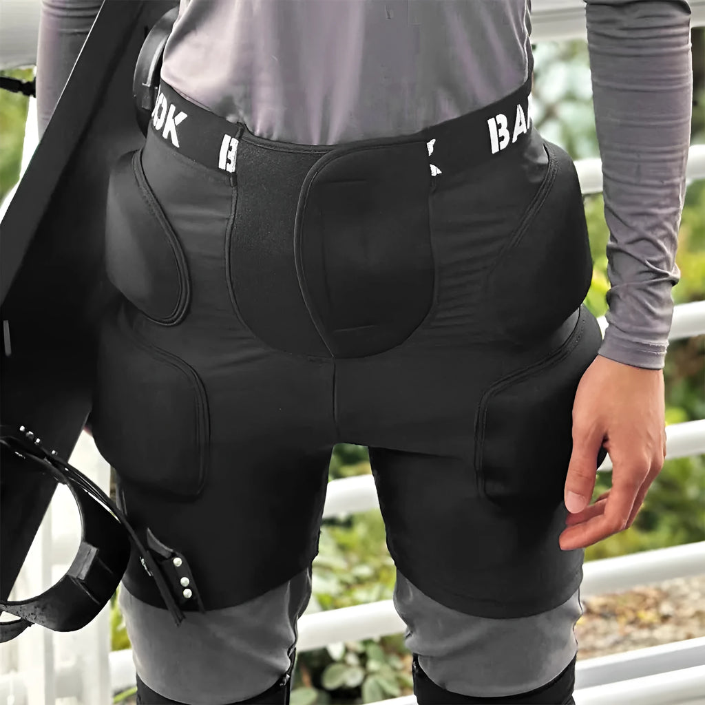 Black Spandex and NBR foam hip protection pad for sports like roller skating and skateboarding.