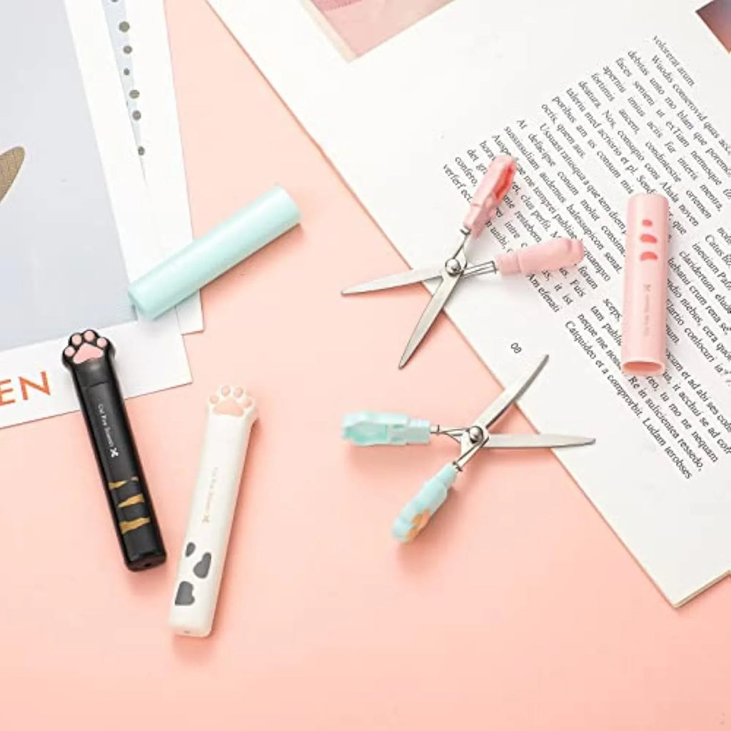 Mini folding scissors with cat paw design in pink, white, black, or blue colours