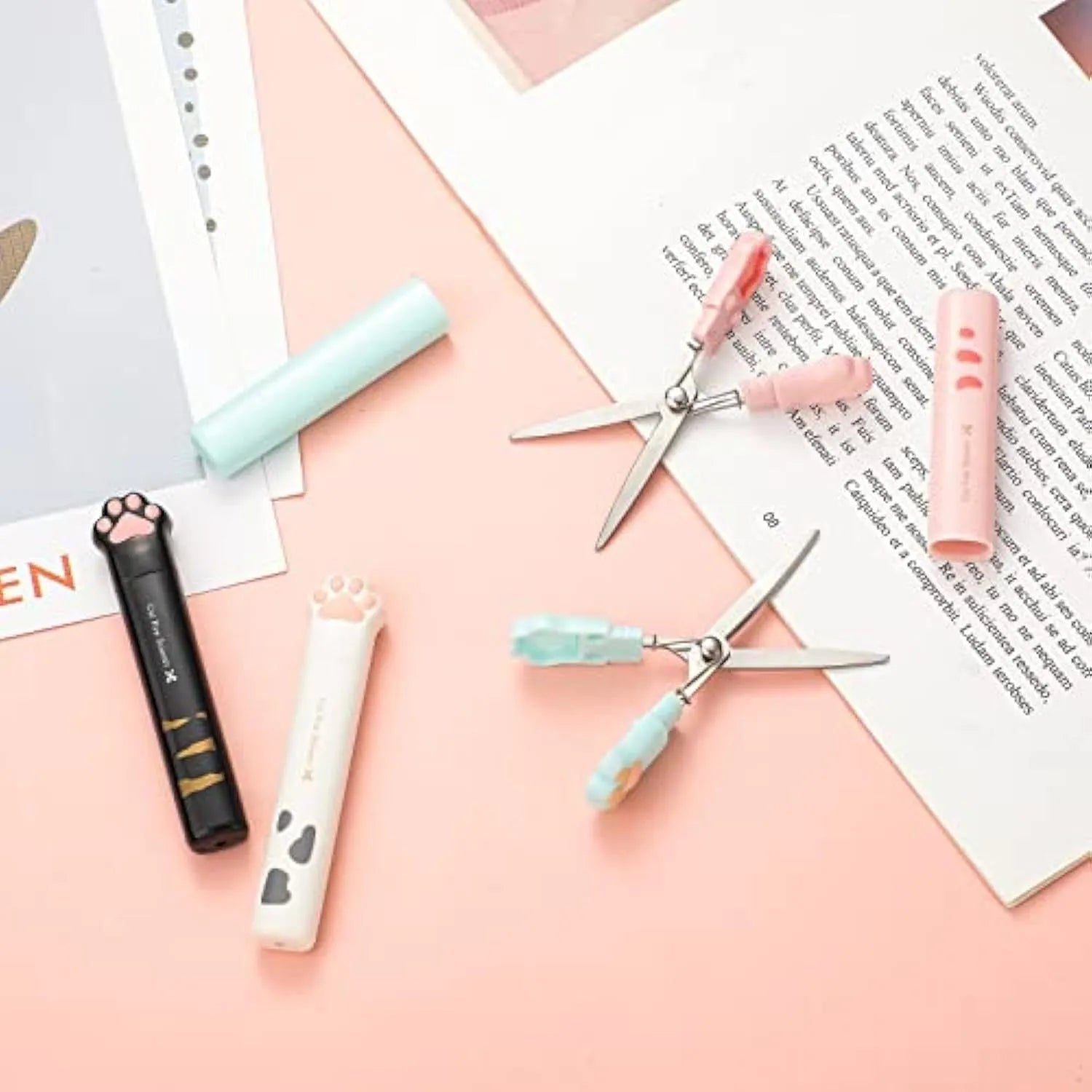Mini folding scissors with cat paw design in pink, white, black, or blue colours