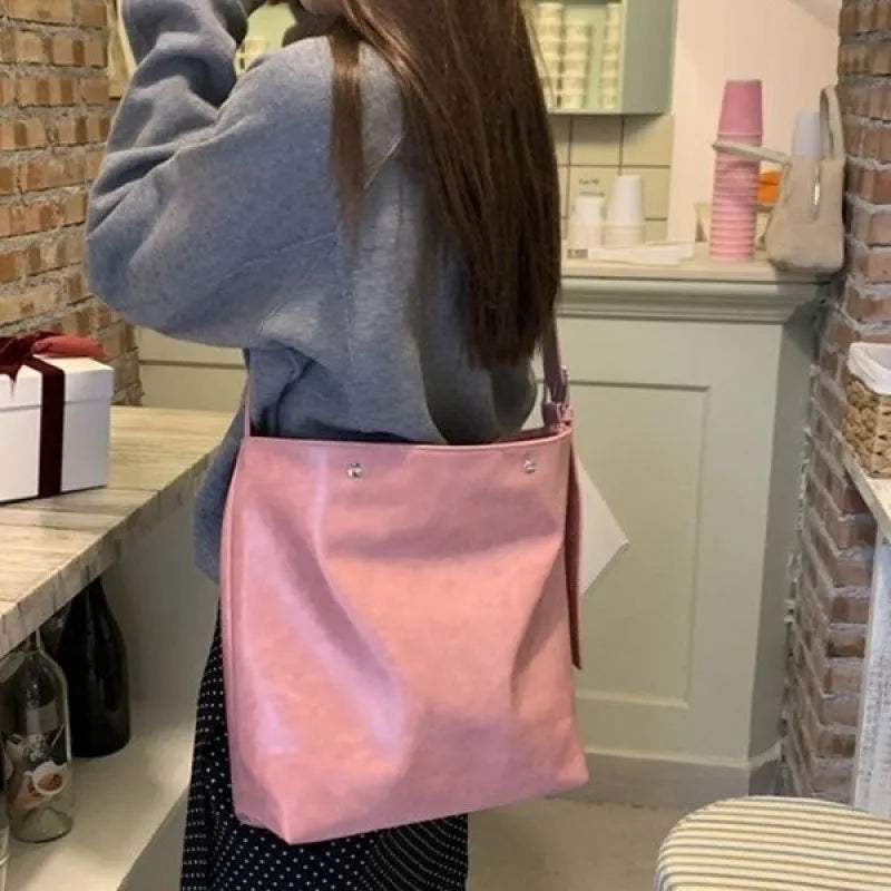 Corduroy one-shoulder commuter bag in pink or brown with PU lining