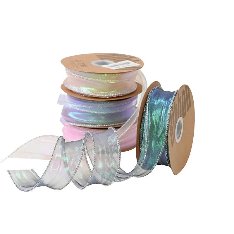 Fishtail yarn floral ribbon roll in mesh material with wave edge pattern measuring 4cm wide