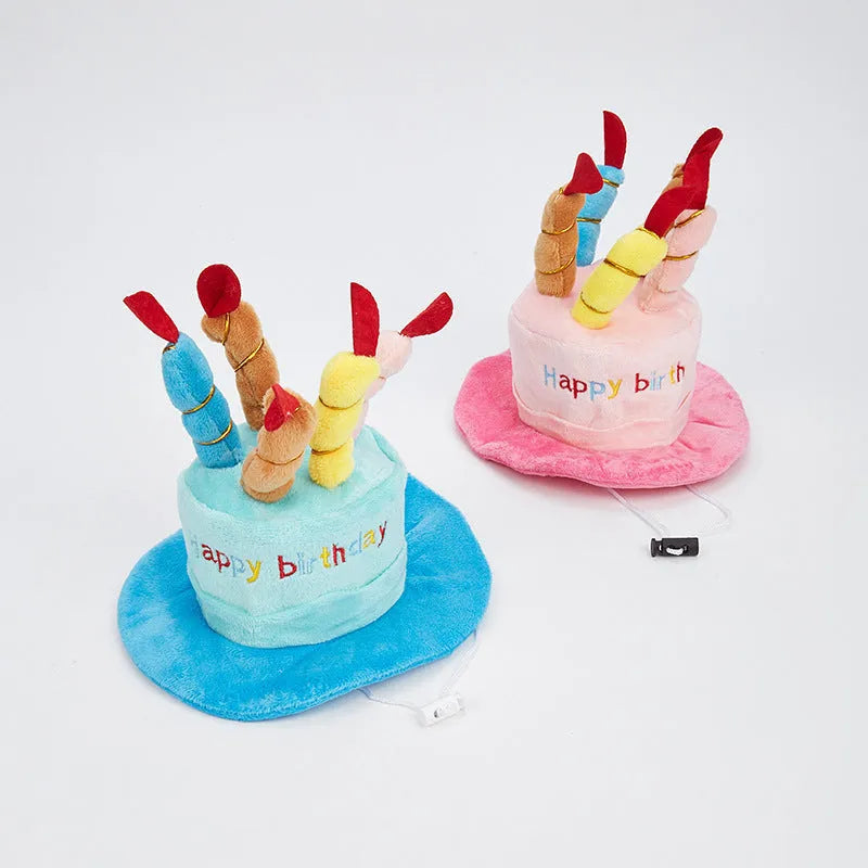 Blue and pink small dog birthday hat with a bone-shaped squeaker toy gift set.