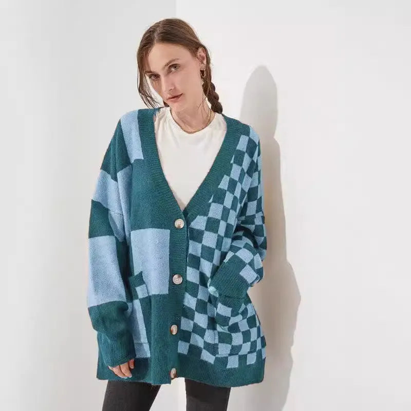 Woman wearing a loose slim fit cardigan with a printed checks pattern in a colour selection.