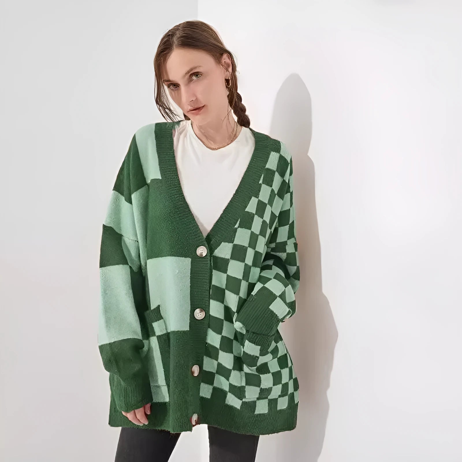 Woman wearing a loose slim fit cardigan with a printed checks pattern in a colour selection.