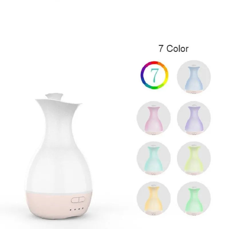 White or pink ultrasonic aromatherapy diffuser with 200ml tank capacity and coloured night light function