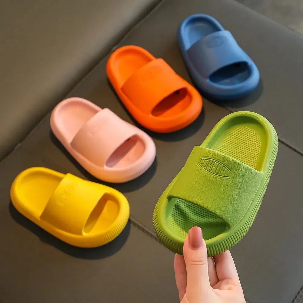 Brightly coloured children's EVA slippers with a textured non-slip sole, shown in multiple colour options.